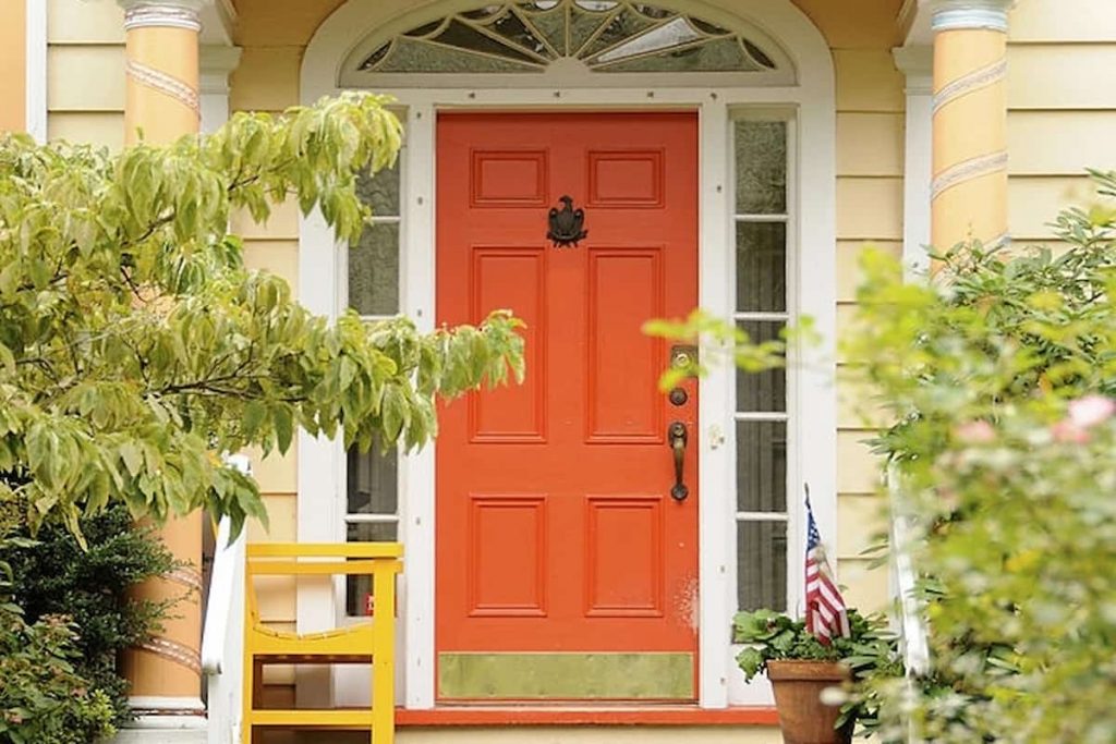 bold and bright orange front door