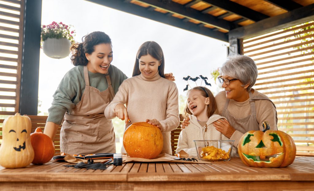 Happy family preparing for Halloween